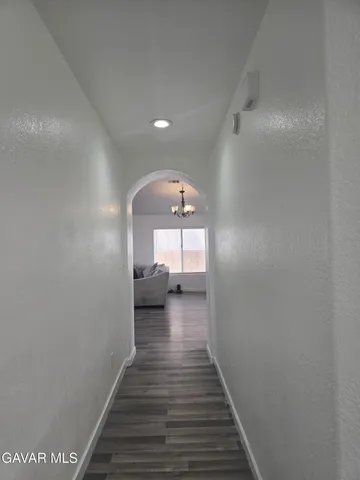 a view of a hallway view with a couch