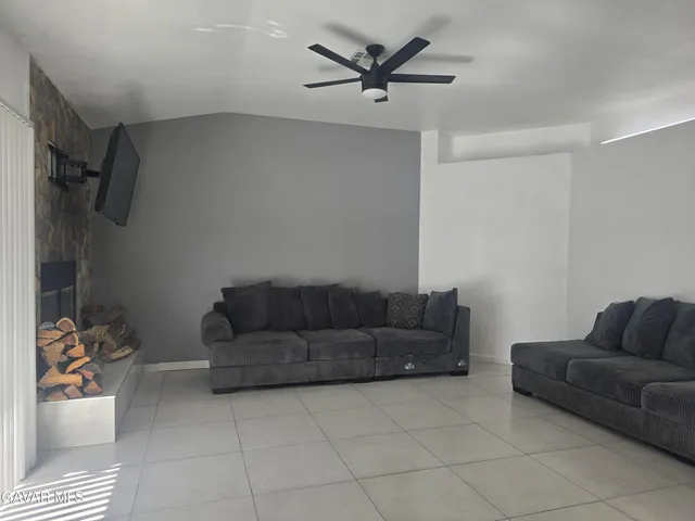 a living room with furniture and a couch