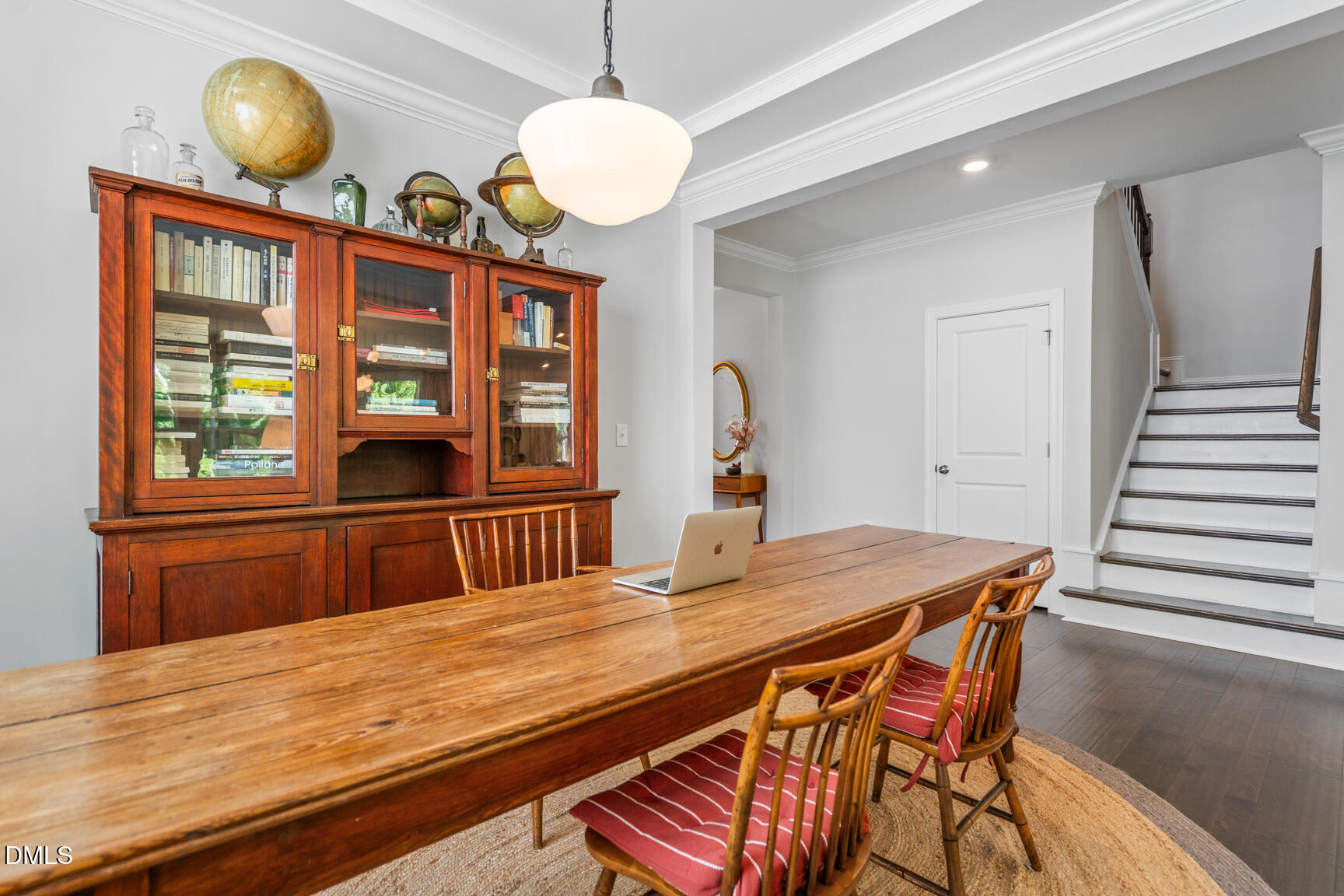2966 Rise And Shine Road Apex, NC 27502 - Photo 10 of 61 a view of a dining room with furniture window and wooden floor