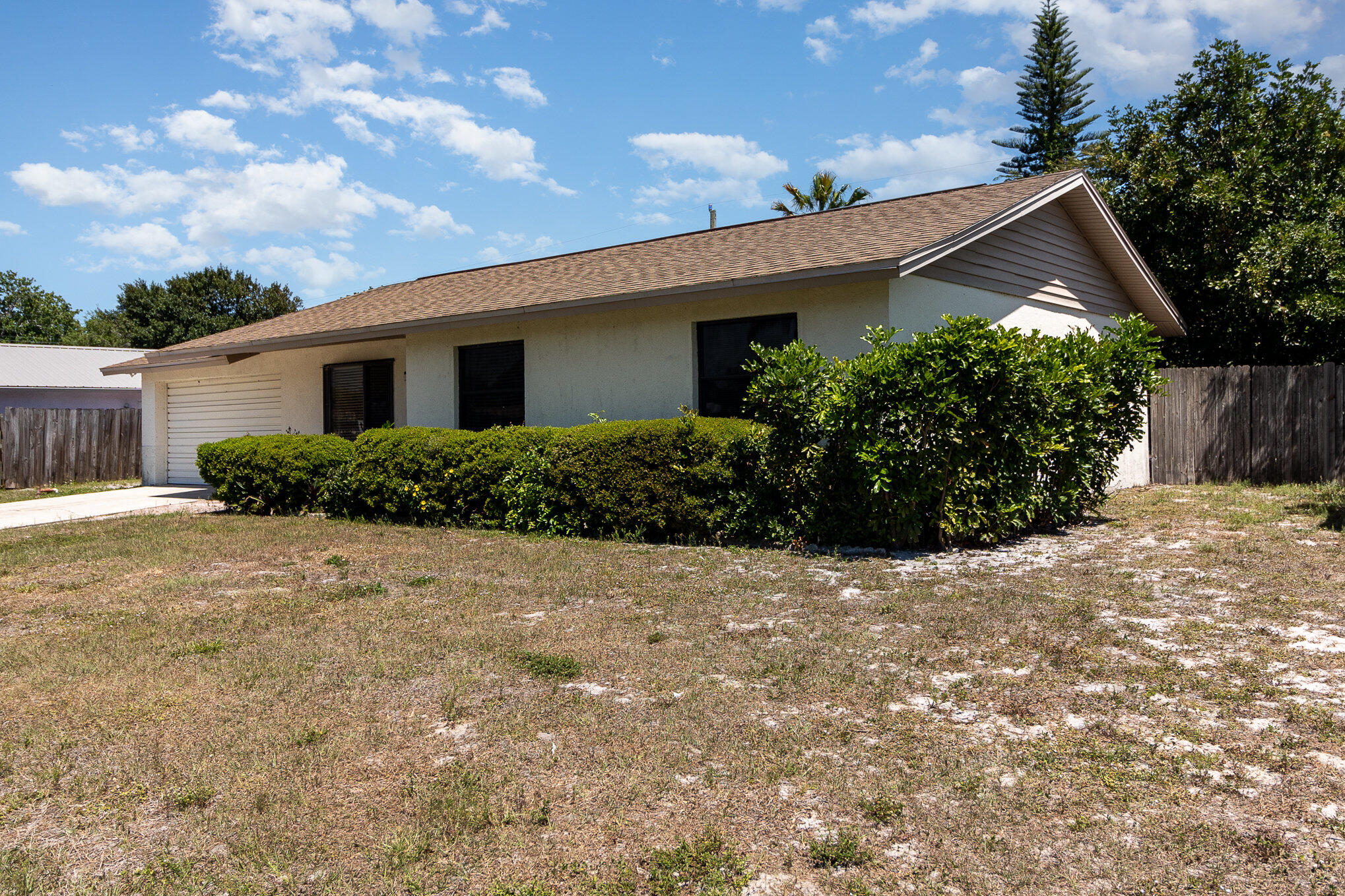 635 Croton Road Melbourne, FL 32935 - Photo 3 of 22 a view of a house with backyard and plants