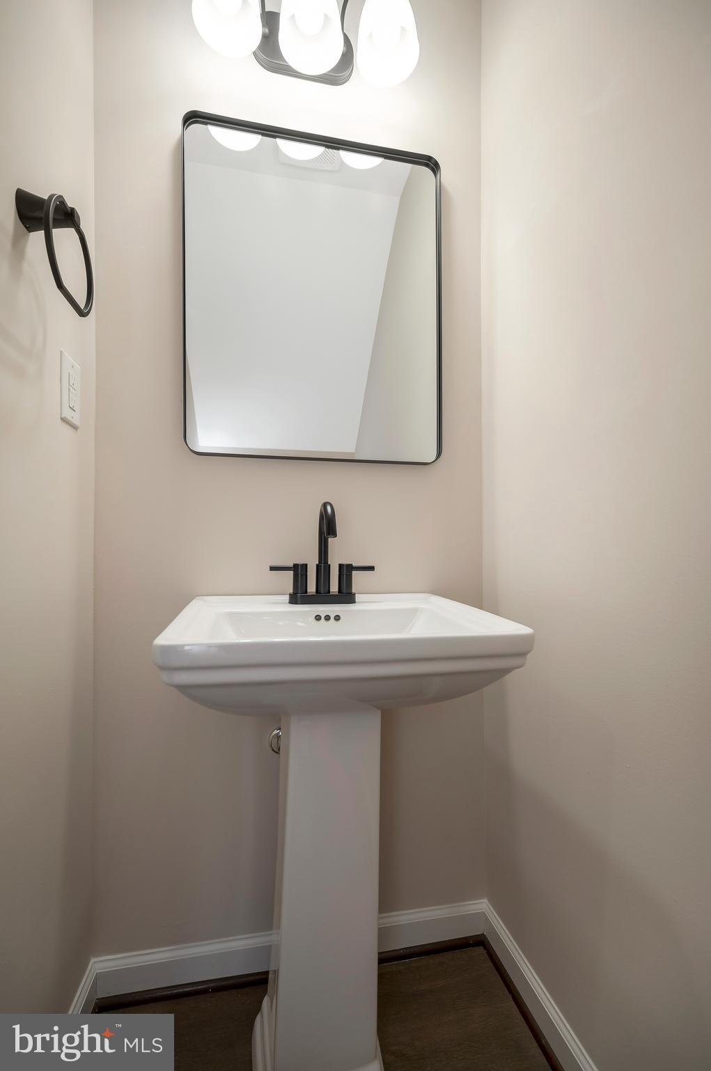 14169 Silver Hill Road Sumerduck, VA 22742 - Photo 7 of 40 a bathroom with a sink a mirror and vanity
