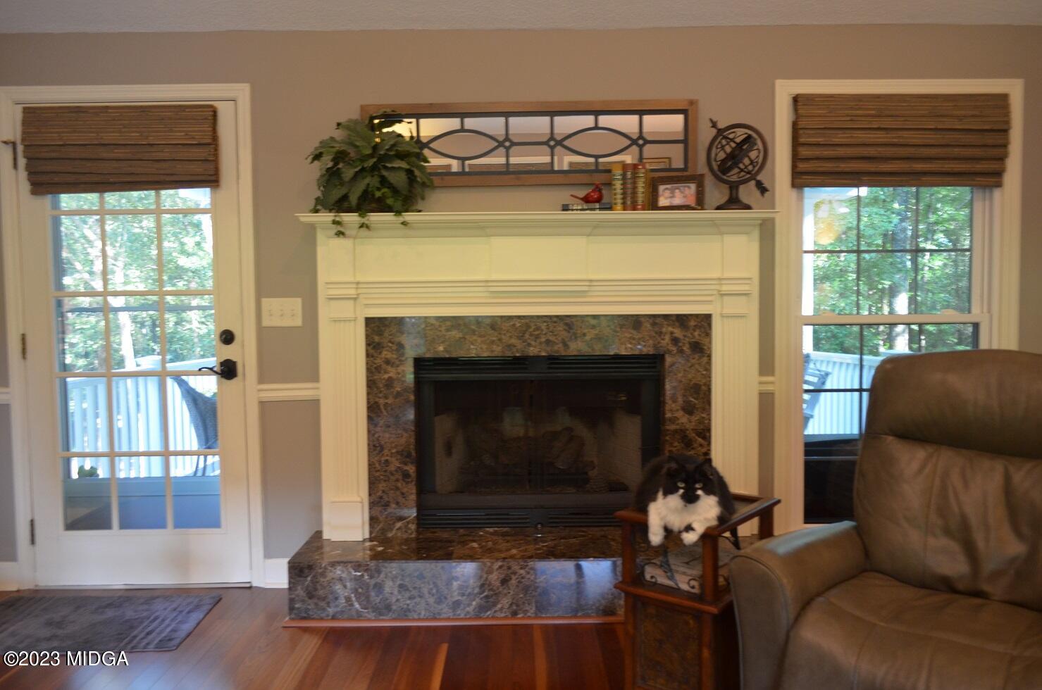 76 Riverside Landing Macon, GA 31210 - Photo 11 of 44 a living room with furniture and a fireplace