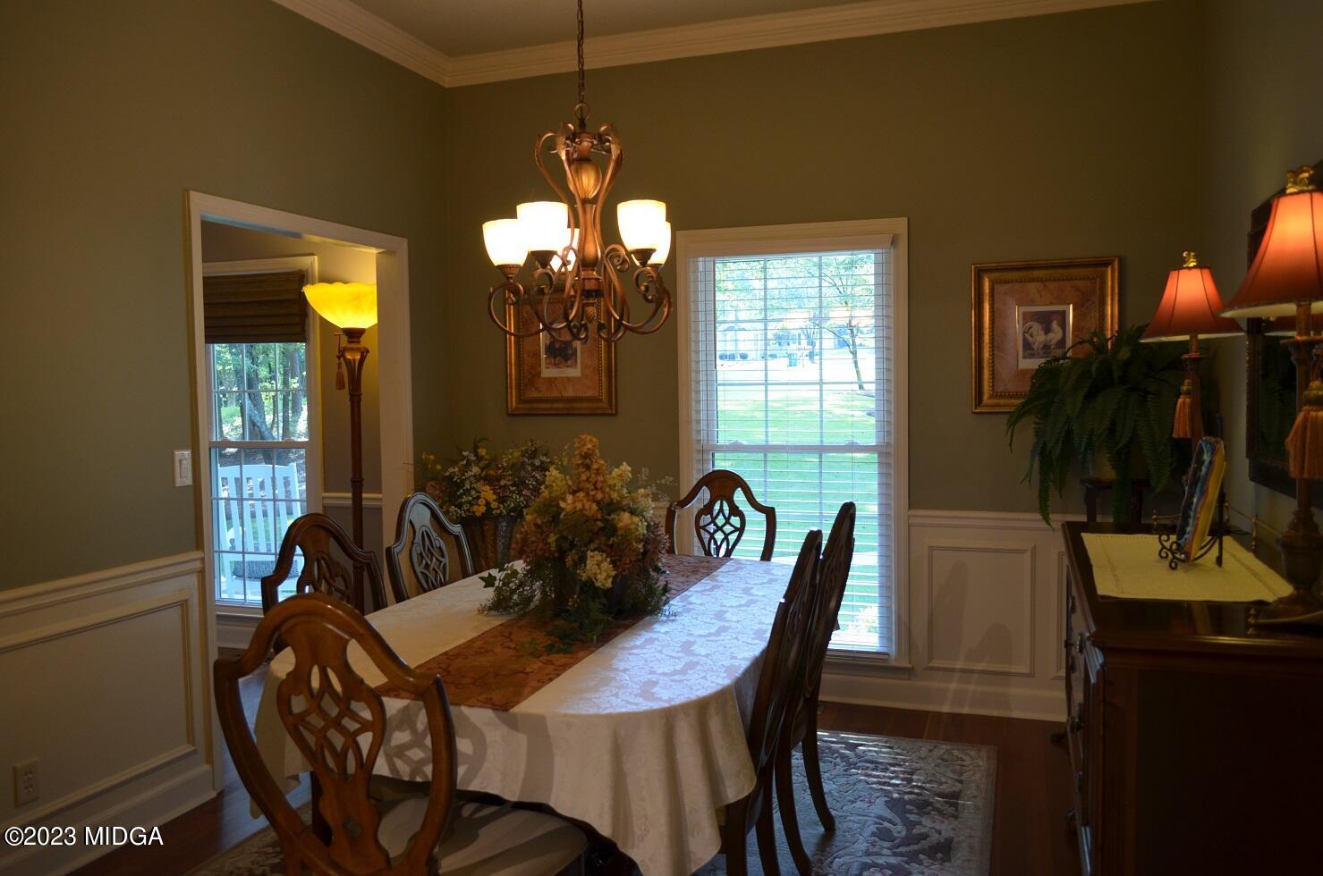 76 Riverside Landing Macon, GA 31210 - Photo 12 of 44 a view of a dining room with furniture and chandelier