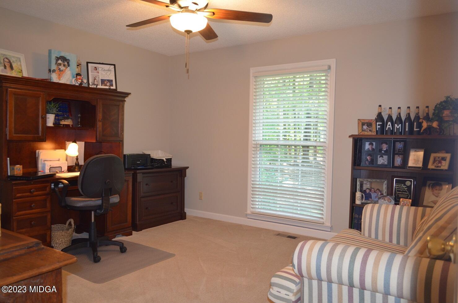 76 Riverside Landing Macon, GA 31210 - Photo 25 of 44 a bed room with furniture and a window