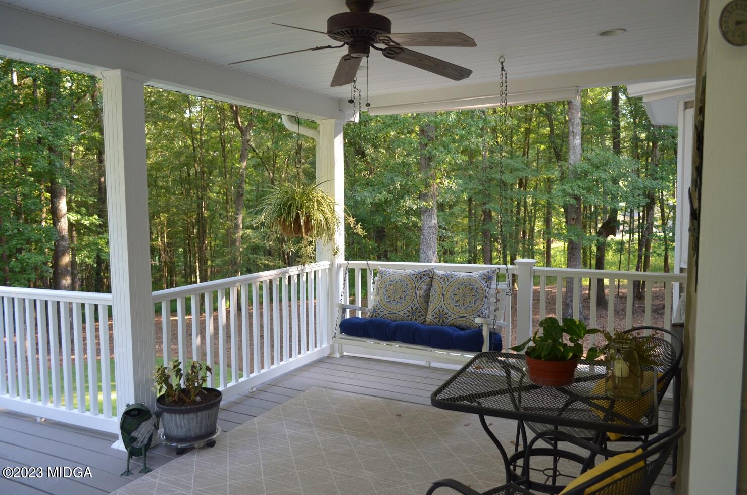 76 Riverside Landing Macon, GA 31210 - Photo 29 of 44 a balcony with couple of chairs and a potted plant