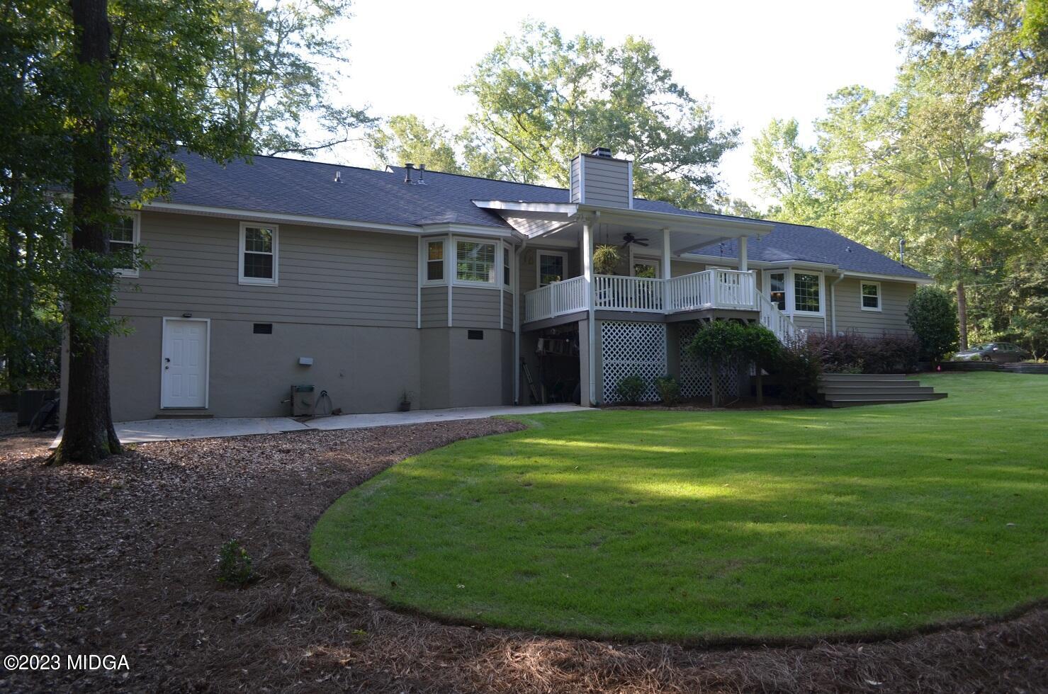 76 Riverside Landing Macon, GA 31210 - Photo 32 of 44 a front view of a house with garden