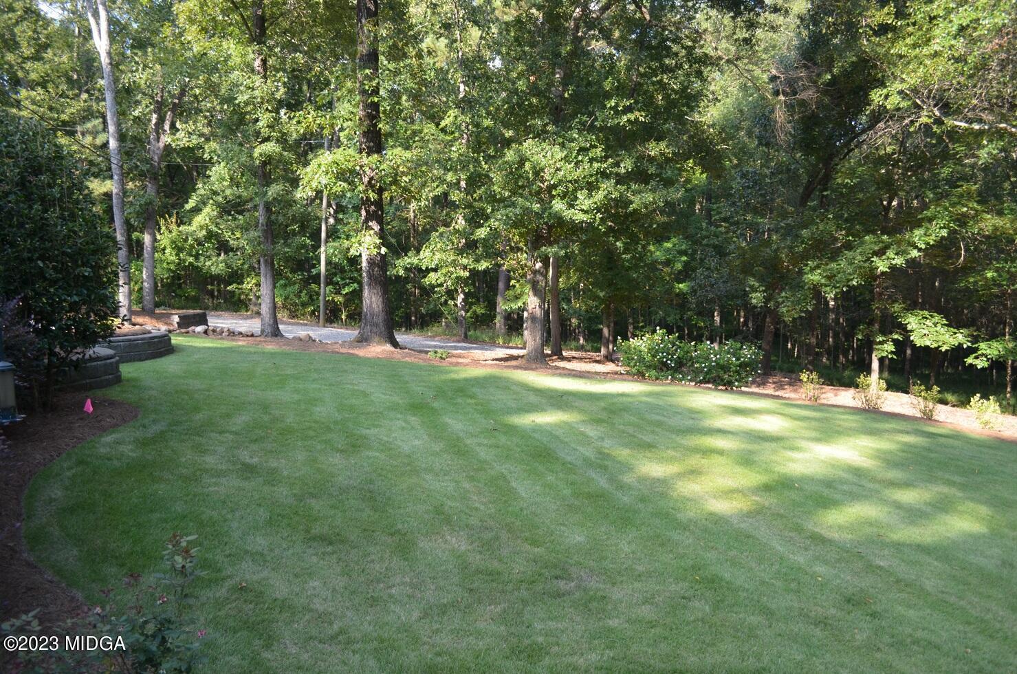 76 Riverside Landing Macon, GA 31210 - Photo 37 of 44 a view of a trees with a yard