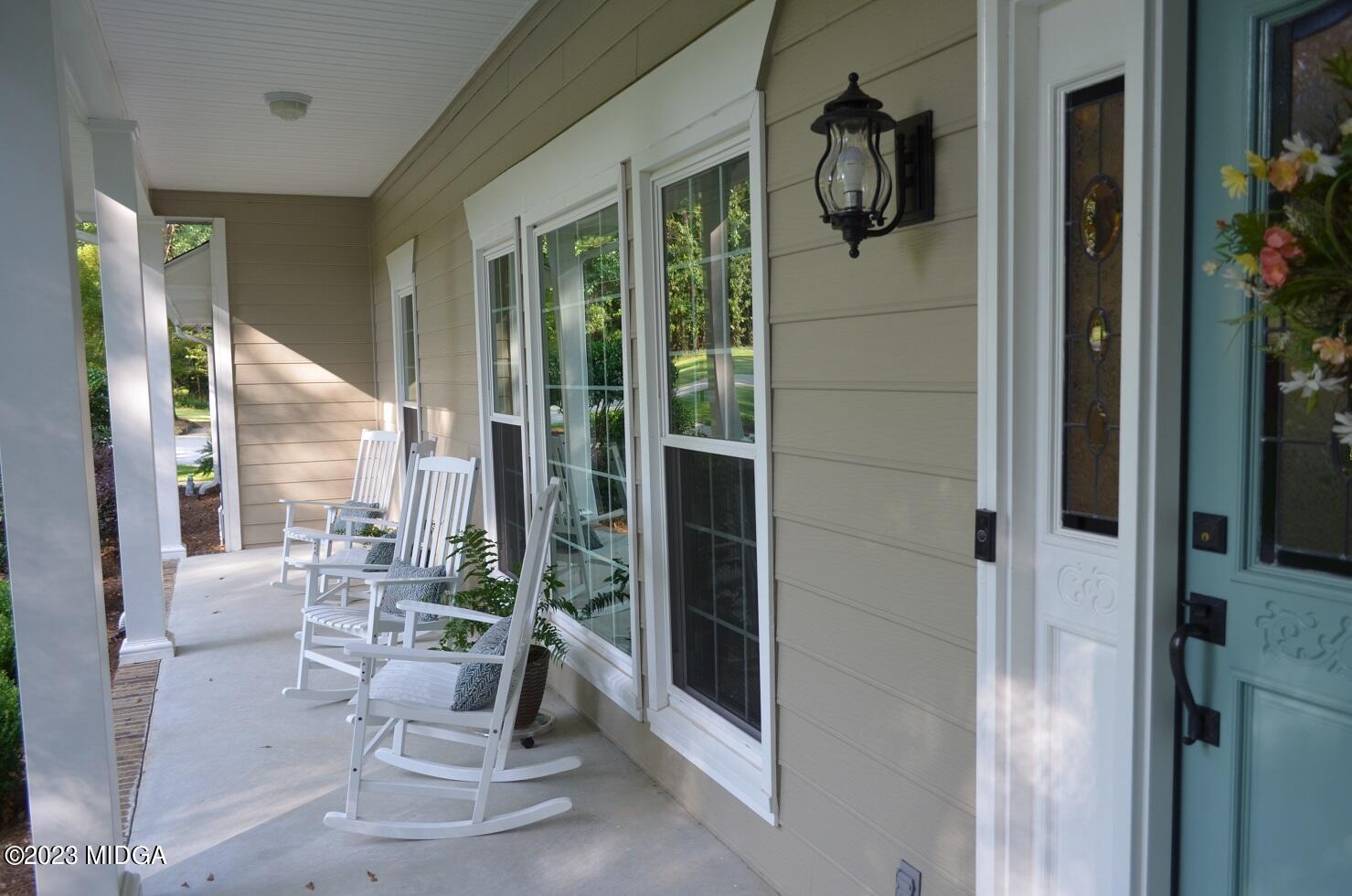 76 Riverside Landing Macon, GA 31210 - Photo 8 of 44 a view of chair in the balcony