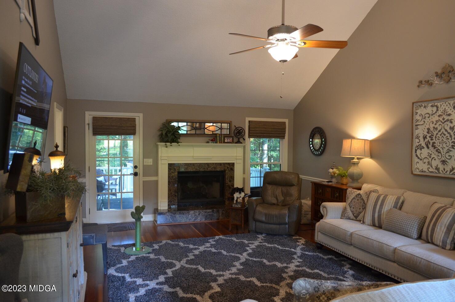 76 Riverside Landing Macon, GA 31210 - Photo 9 of 44 a living room with furniture and a fireplace