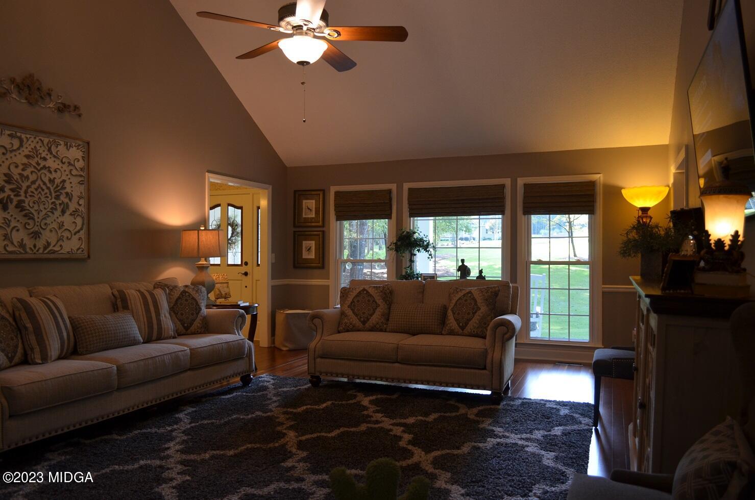 76 Riverside Landing Macon, GA 31210 - Photo 10 of 44 a living room with furniture and a large window