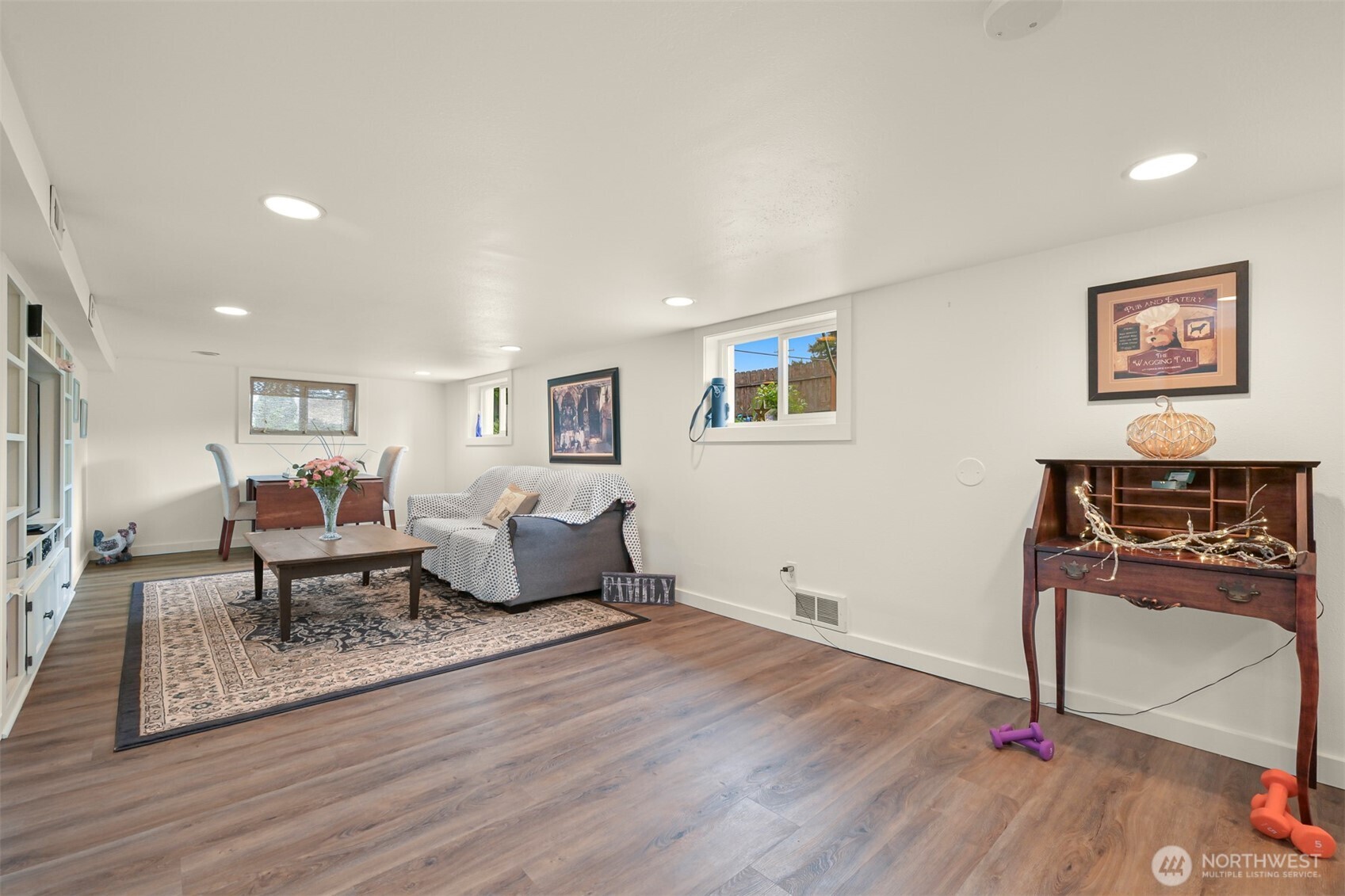 8490 Benson Road Lynden, WA 98264 - Photo 22 of 40 a living room with furniture and a wooden floor