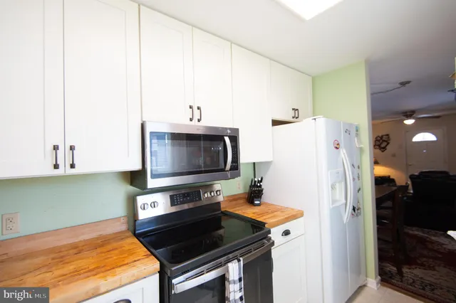 a bedroom with a bed and a table in it