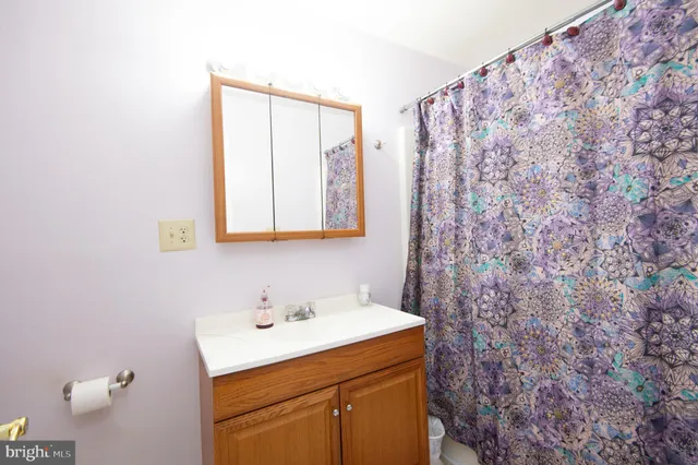 a view of a hallway with closet