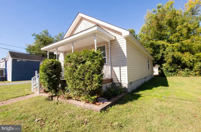 a view of gym equipment with furniture and toys