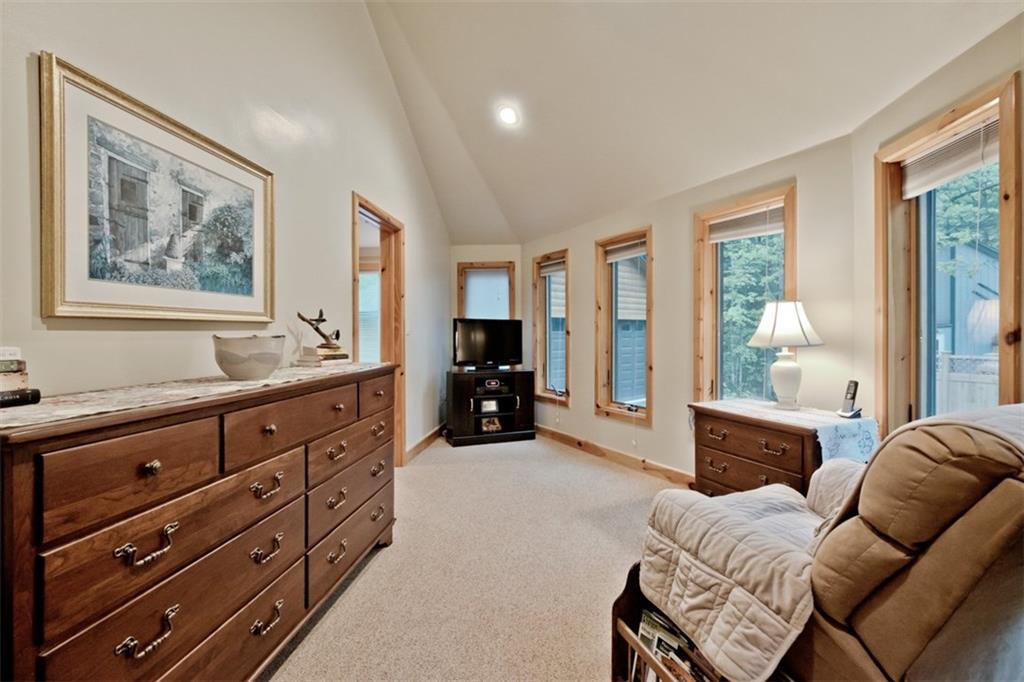 60 Mountain Road Bridgton, ME 04009 - Photo 16 of 35 The sunroom has lots of windows and...