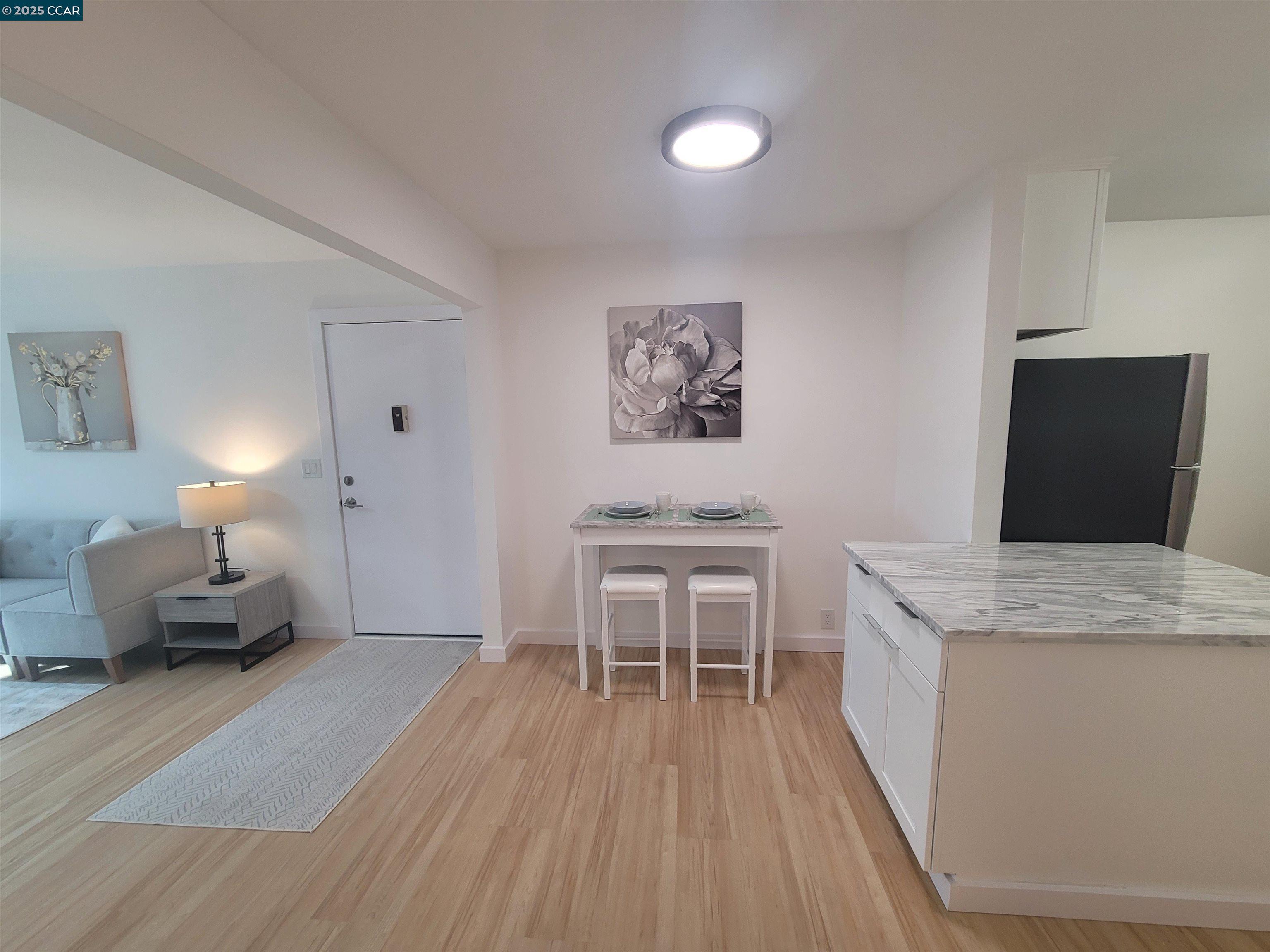 375 Camelback Road, Unit 23 Pleasant Hill, CA 94523 - Photo 20 of 42 a living room with furniture and a flat screen tv