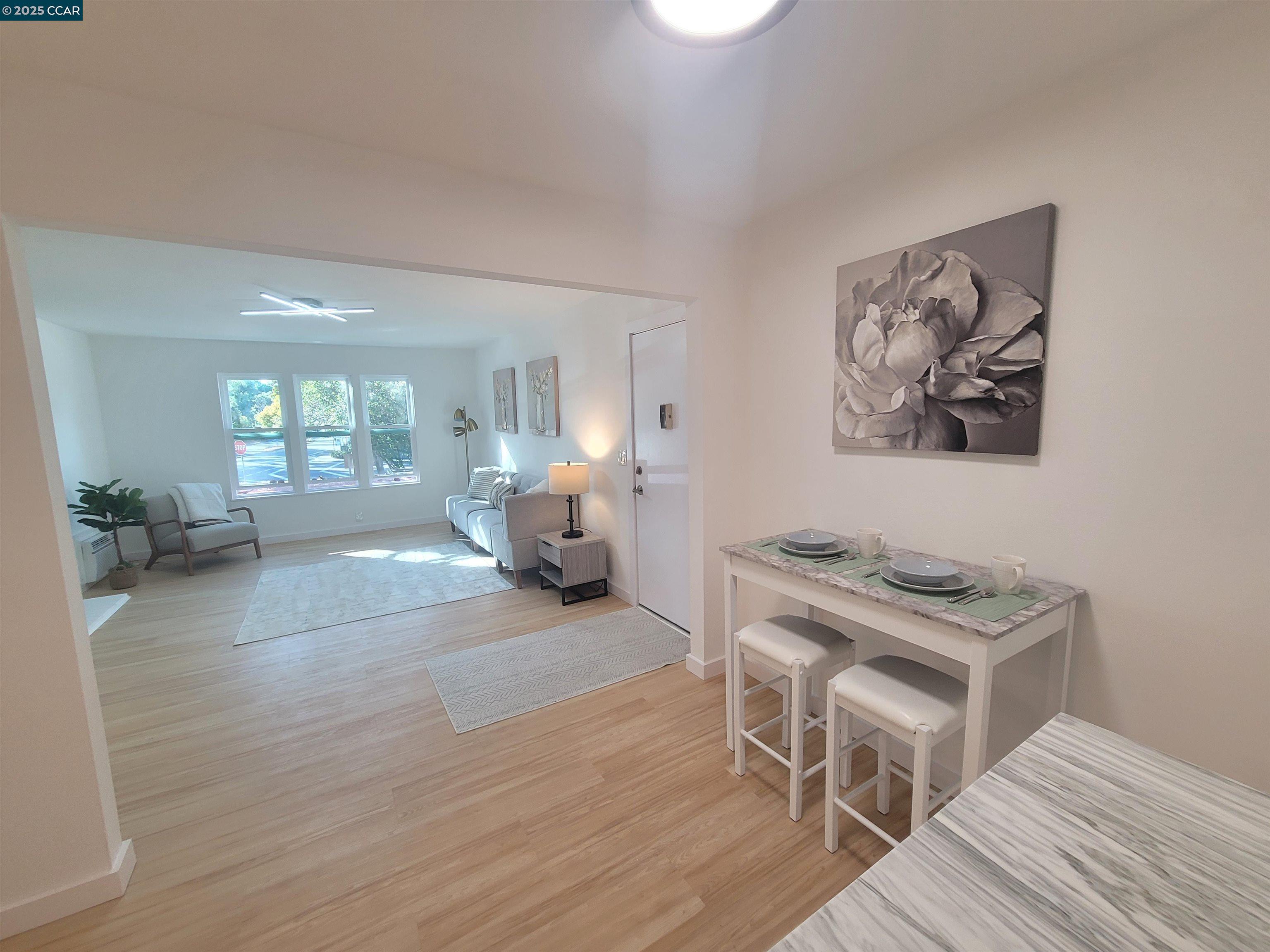 375 Camelback Road, Unit 23 Pleasant Hill, CA 94523 - Photo 23 of 58 a living room with furniture and a table