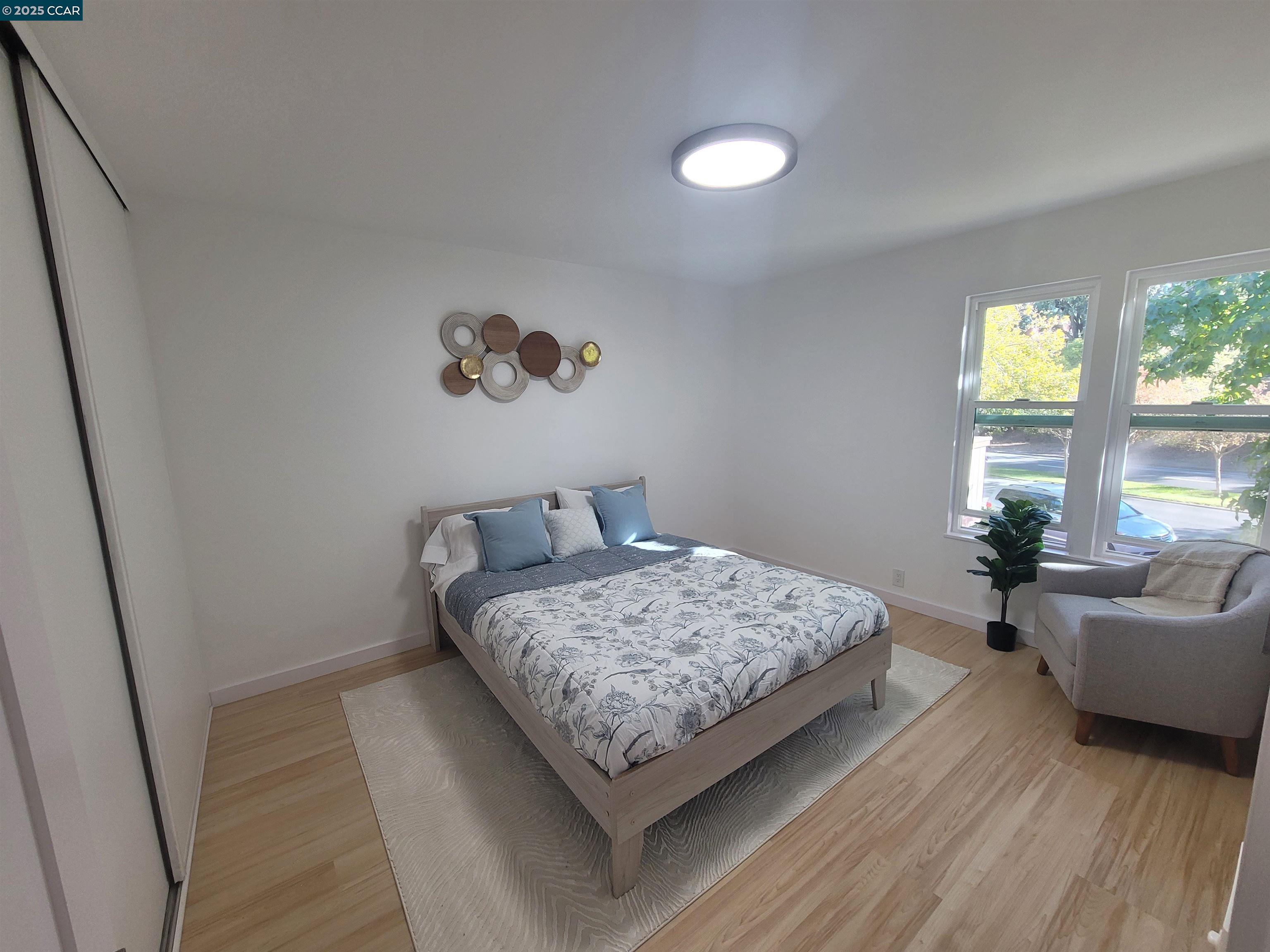375 Camelback Road, Unit 23 Pleasant Hill, CA 94523 - Photo 27 of 42 a living room with furniture and a window