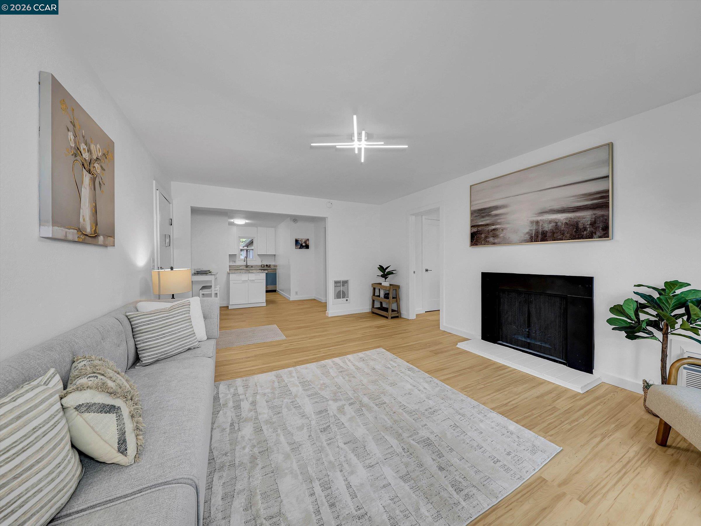 375 Camelback Road, Unit 23 Pleasant Hill, CA 94523 - Photo 56 of 58 a view of living room with furniture and a fireplace
