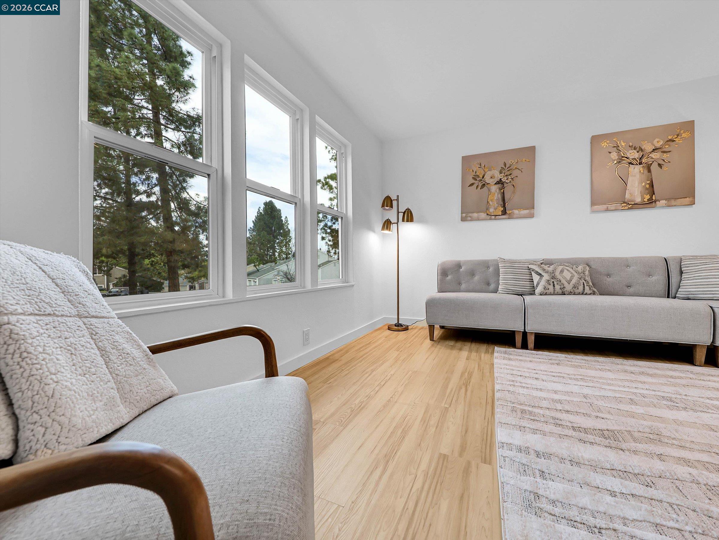 375 Camelback Road, Unit 23 Pleasant Hill, CA 94523 - Photo 57 of 58 a living room with furniture and a large window