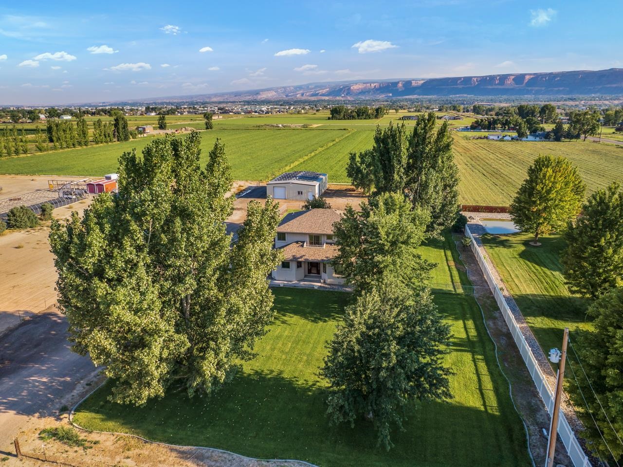 2107 I I- 1/2 Road Grand Junction, CO 81505 - Photo 2 of 42 a view of a lake with a city