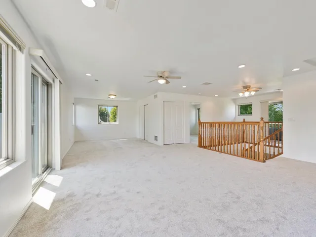a view of a hallway with a in closet