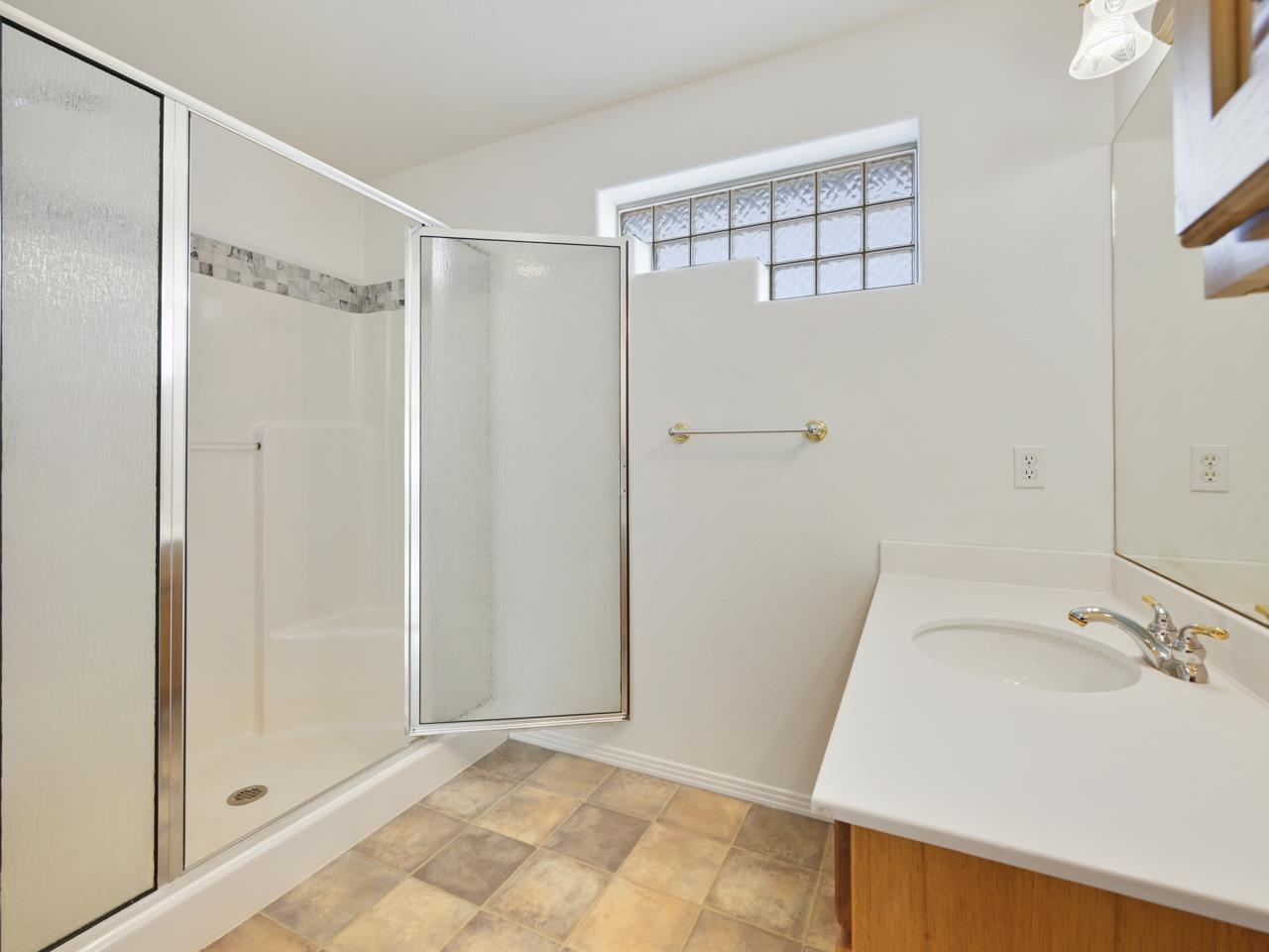 2107 I I- 1/2 Road Grand Junction, CO 81505 - Photo 26 of 42 a bathroom with a sink and shower