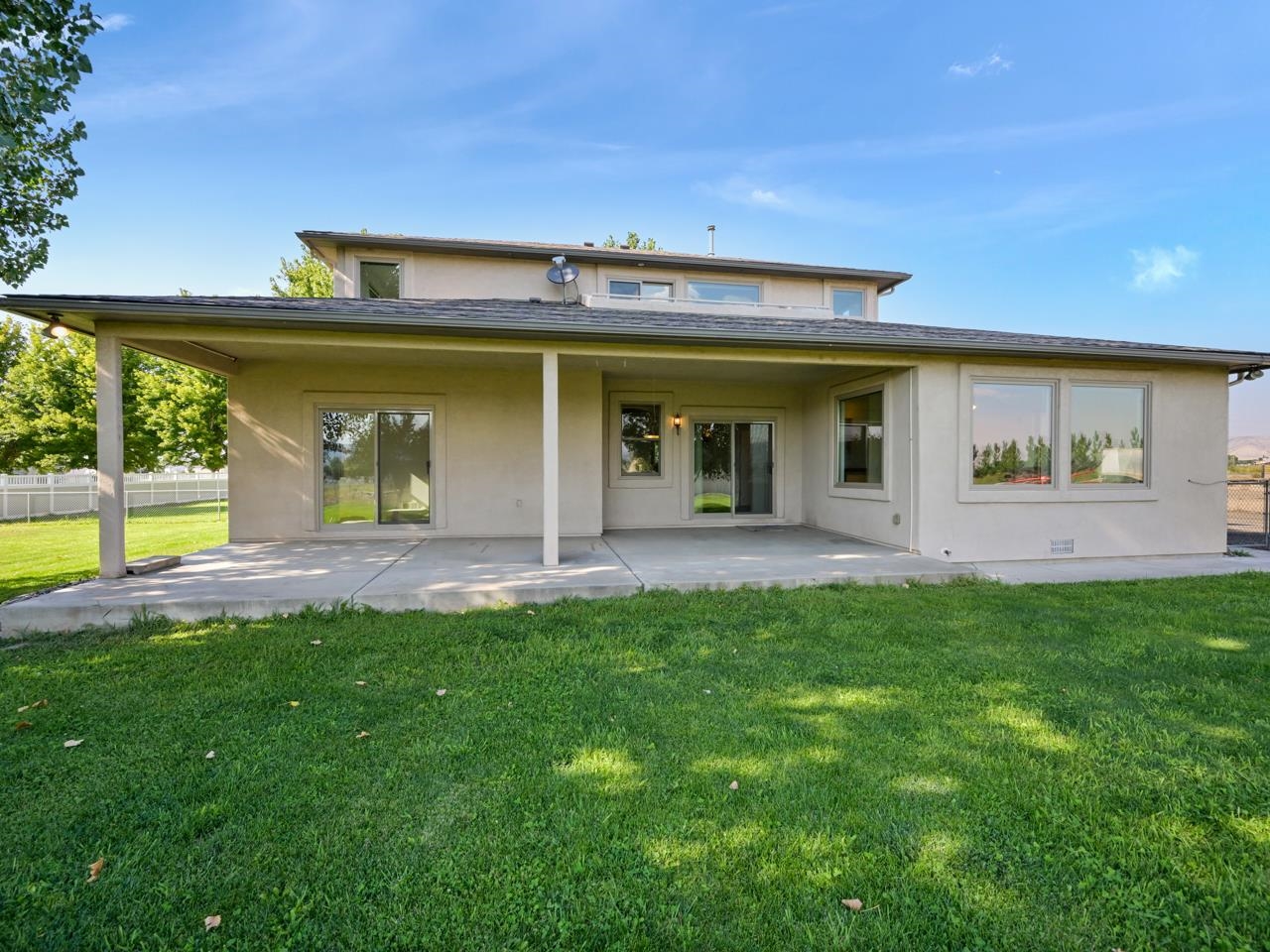 2107 I I- 1/2 Road Grand Junction, CO 81505 - Photo 32 of 42 a view of a house with backyard porch and sitting area