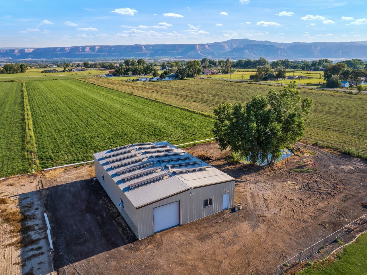 2107 I I- 1/2 Road Grand Junction, CO 81505 - Photo 38 of 42 a view of a lake with a mountain