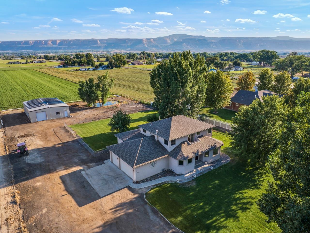 2107 I I- 1/2 Road Grand Junction, CO 81505 - Photo 40 of 42 an aerial view of a house with outdoor space lake view and mountain view