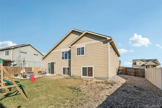 a view of a house with a patio