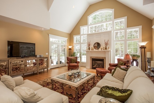 3 Bridle Path Road Wilbraham, MA 01095 - Photo 13 of 30 a living room with furniture a fireplace and a flat screen tv
