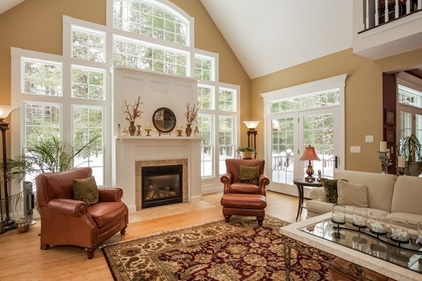 3 Bridle Path Road Wilbraham, MA 01095 - Photo 15 of 30 a living room with furniture a fireplace and floor to ceiling windows