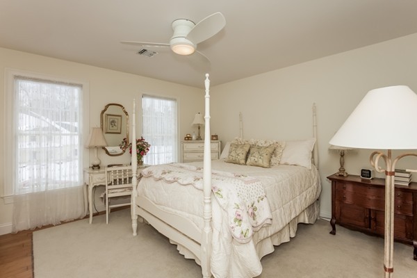 3 Bridle Path Road Wilbraham, MA 01095 - Photo 23 of 30 a bedroom with a bed a chandelier and dresser