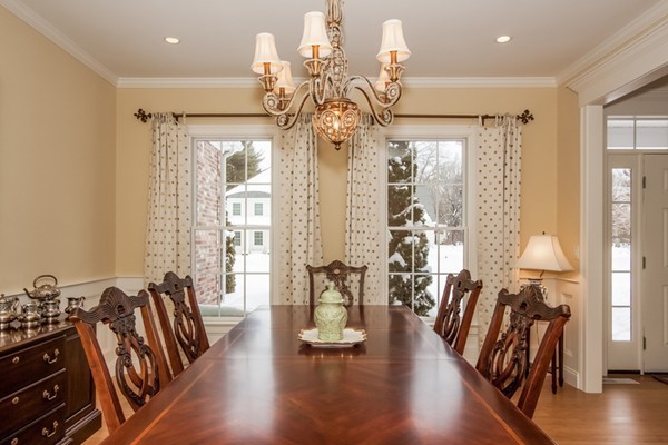 3 Bridle Path Road Wilbraham, MA 01095 - Photo 6 of 30 a hallway with wooden floor chandelier and windows