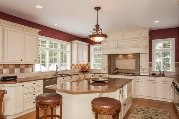 3 Bridle Path Road Wilbraham, MA 01095 - Photo 9 of 30 a kitchen with a sink stove a table and chairs