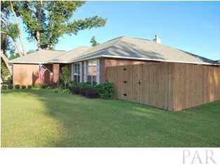 4871 Pineview Ridge Road Pace, FL 32571 - Photo 15 of 16 Corner lot is very spacious. Backyard is completely fenced.