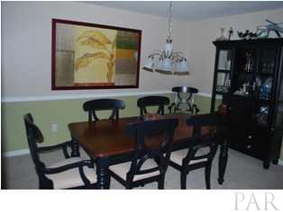 4871 Pineview Ridge Road Pace, FL 32571 - Photo 3 of 16 Spacious Dining Room with chair rail
