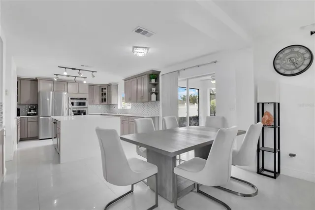 a view of a dining room with furniture