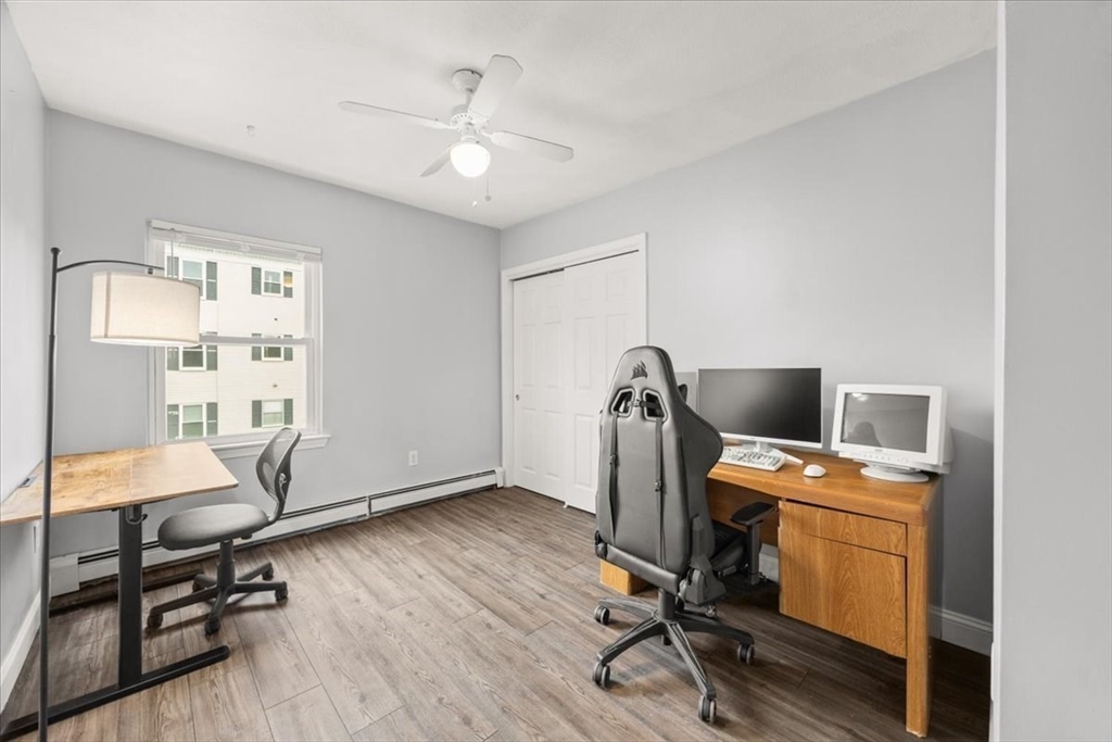 35 Hazel Street, Unit B Attleboro, MA 02703 - Photo 15 of 21 a view of a workspace with furniture and a window