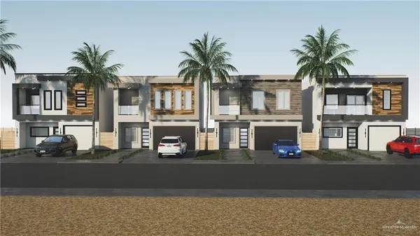 a front view of residential houses with street