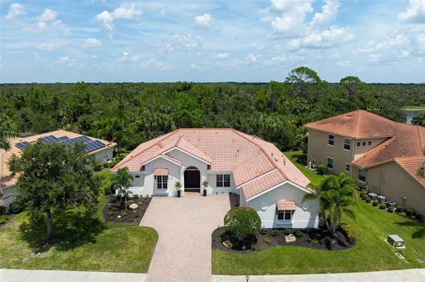 a view of house with garden space and street view