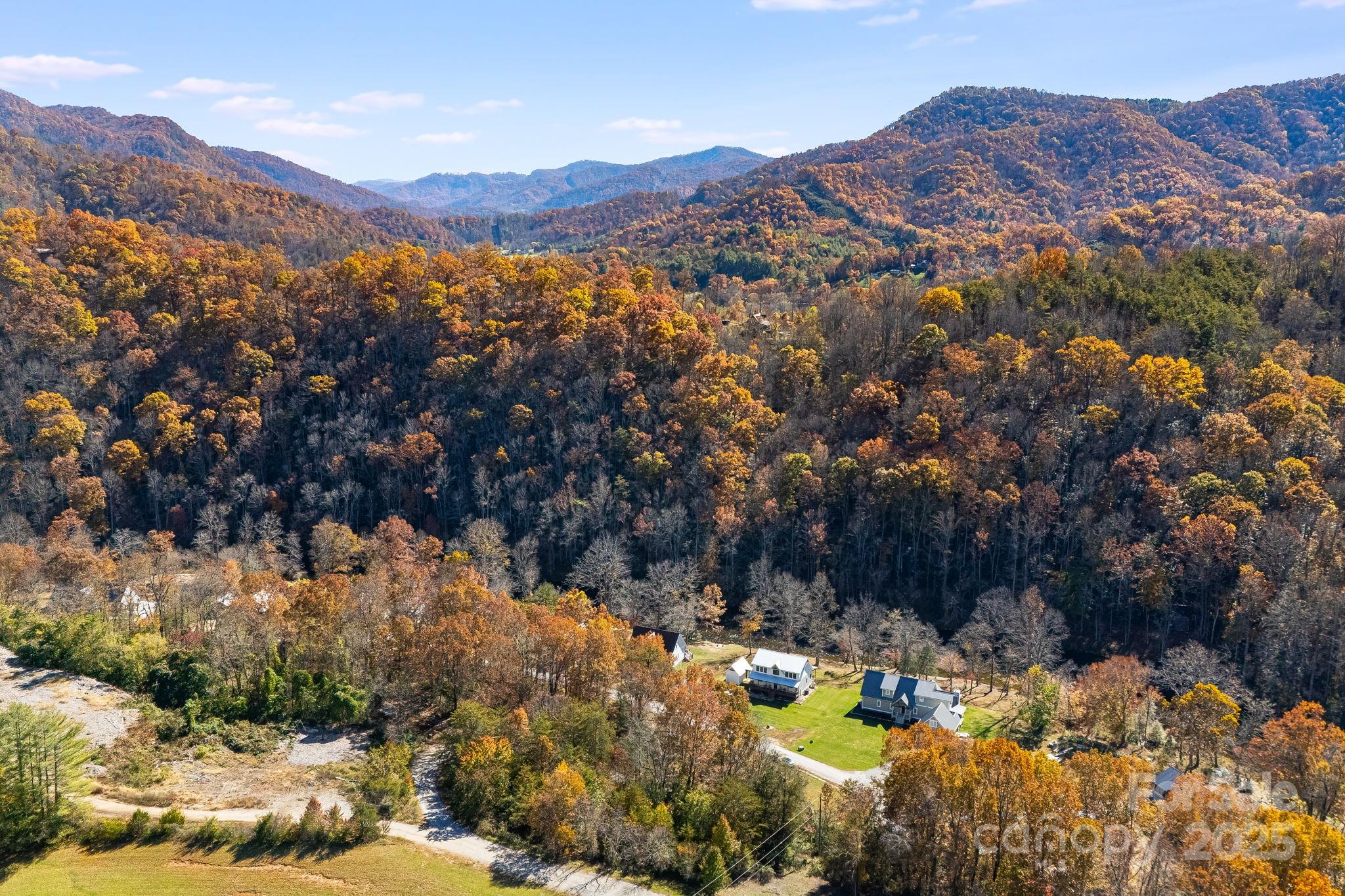 Lot 9 A Light, Unit LOT 9A Cullowhee, NC 28723 - Photo 11 of 17 a view of a forest with mountains in the background