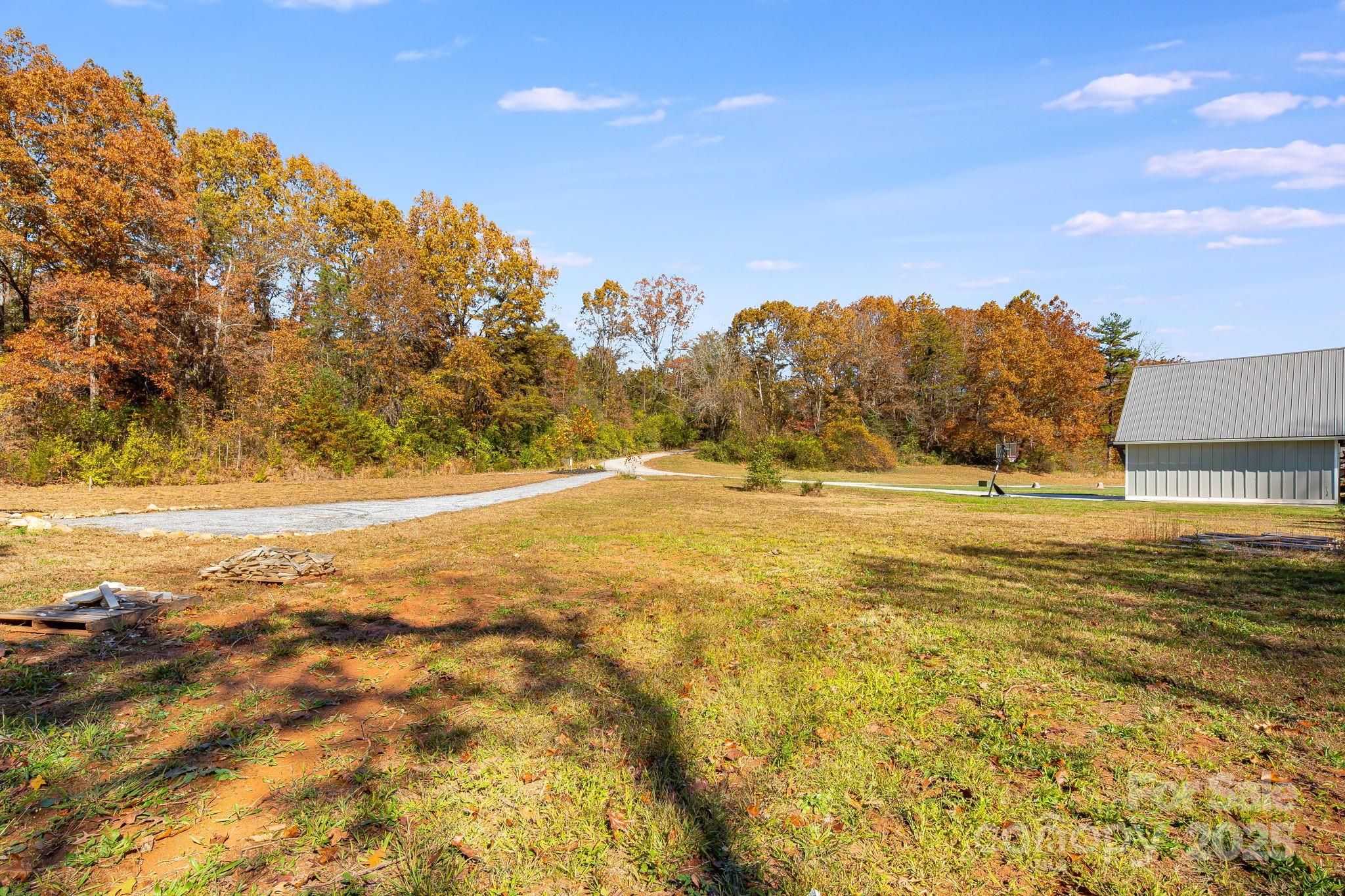 Lot 9 A Light, Unit LOT 9A Cullowhee, NC 28723 - Photo 16 of 17 a view of lake with mountain