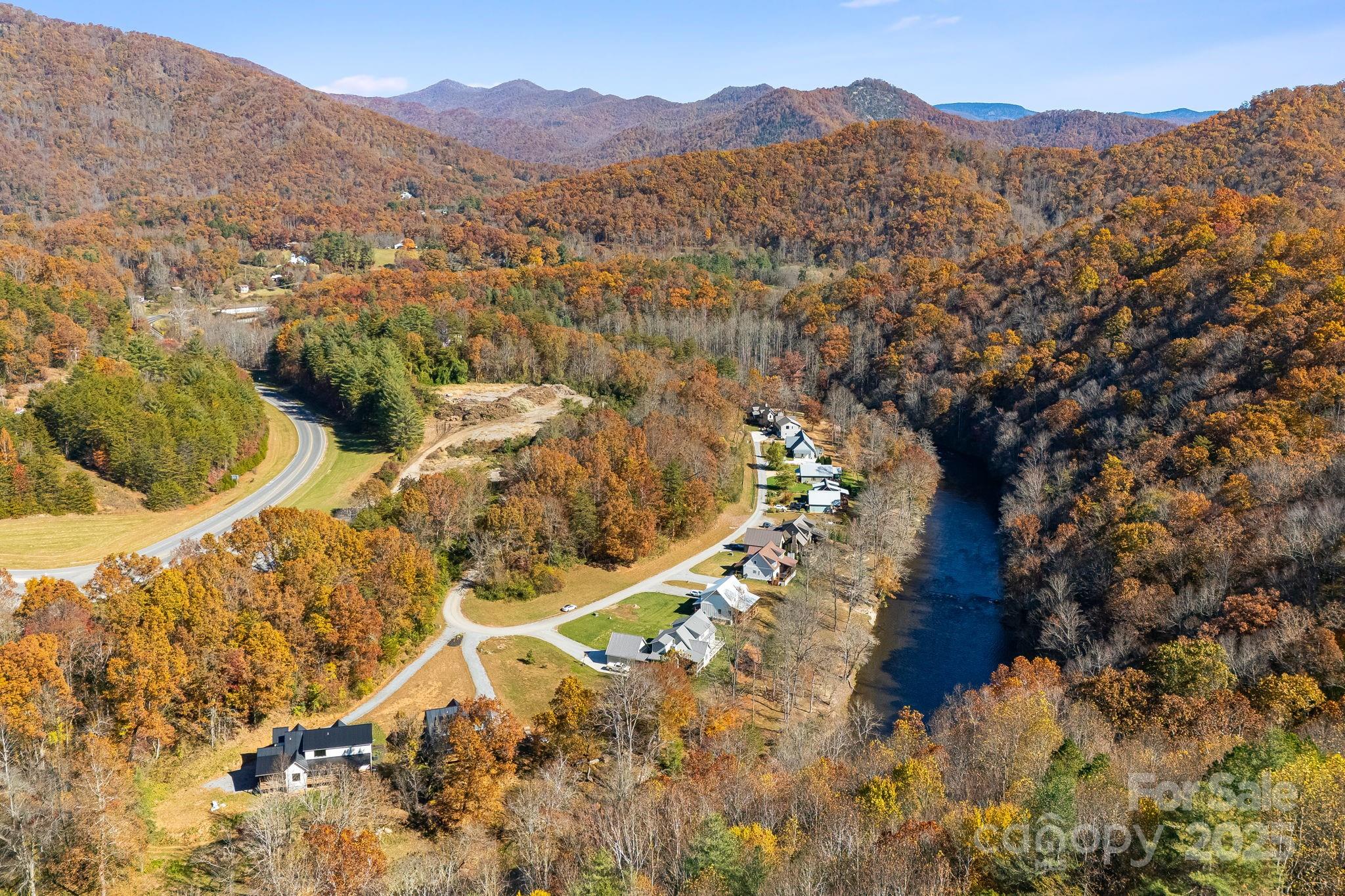 Lot 9 A Light, Unit LOT 9A Cullowhee, NC 28723 - Photo 2 of 17 a view of a top of a house with a mountain