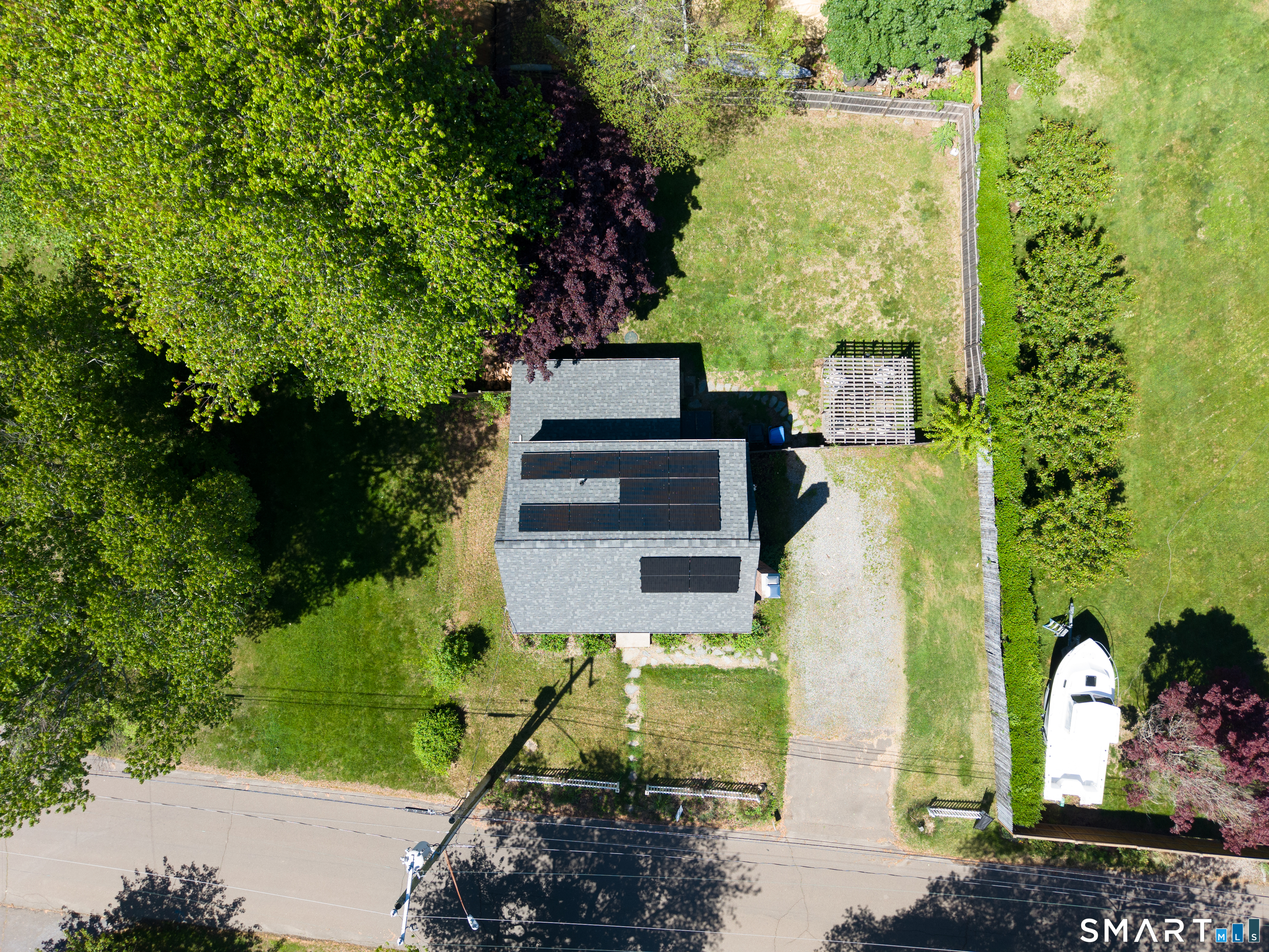 15 Bluff Avenue Clinton, CT 06413 - Photo 32 of 38 a view of a yard with plants