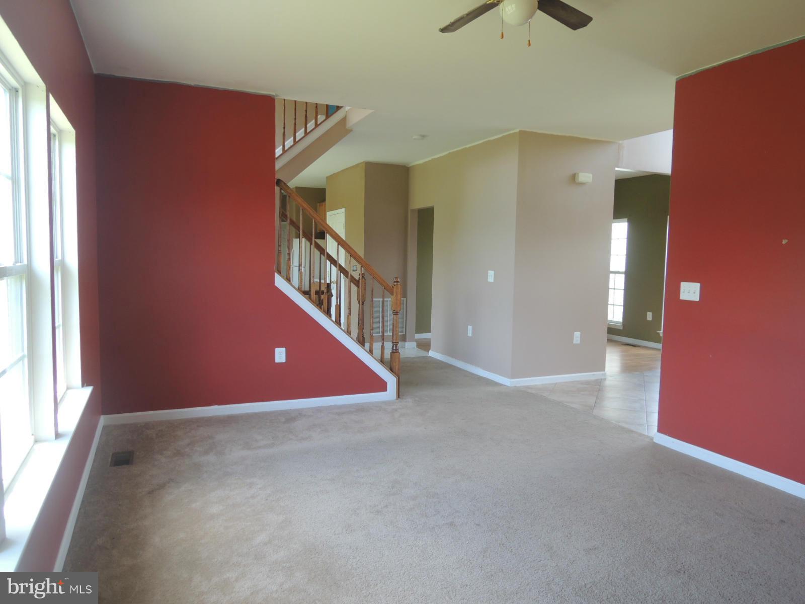 45 Boise Road Inwood, WV 25428 - Photo 11 of 30 an empty room with windows