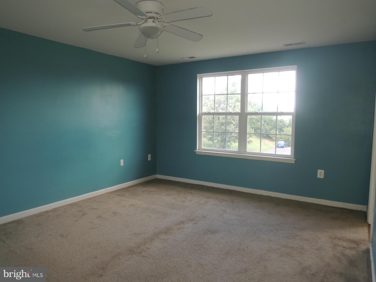 45 Boise Road Inwood, WV 25428 - Photo 15 of 30 an empty room with a window