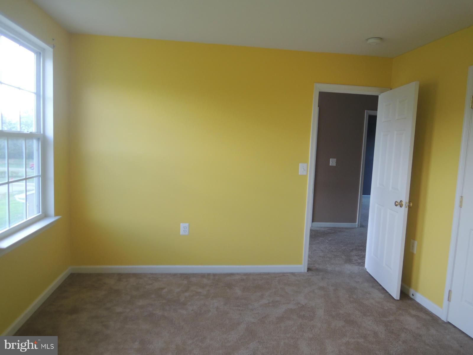 45 Boise Road Inwood, WV 25428 - Photo 19 of 30 an empty room with windows