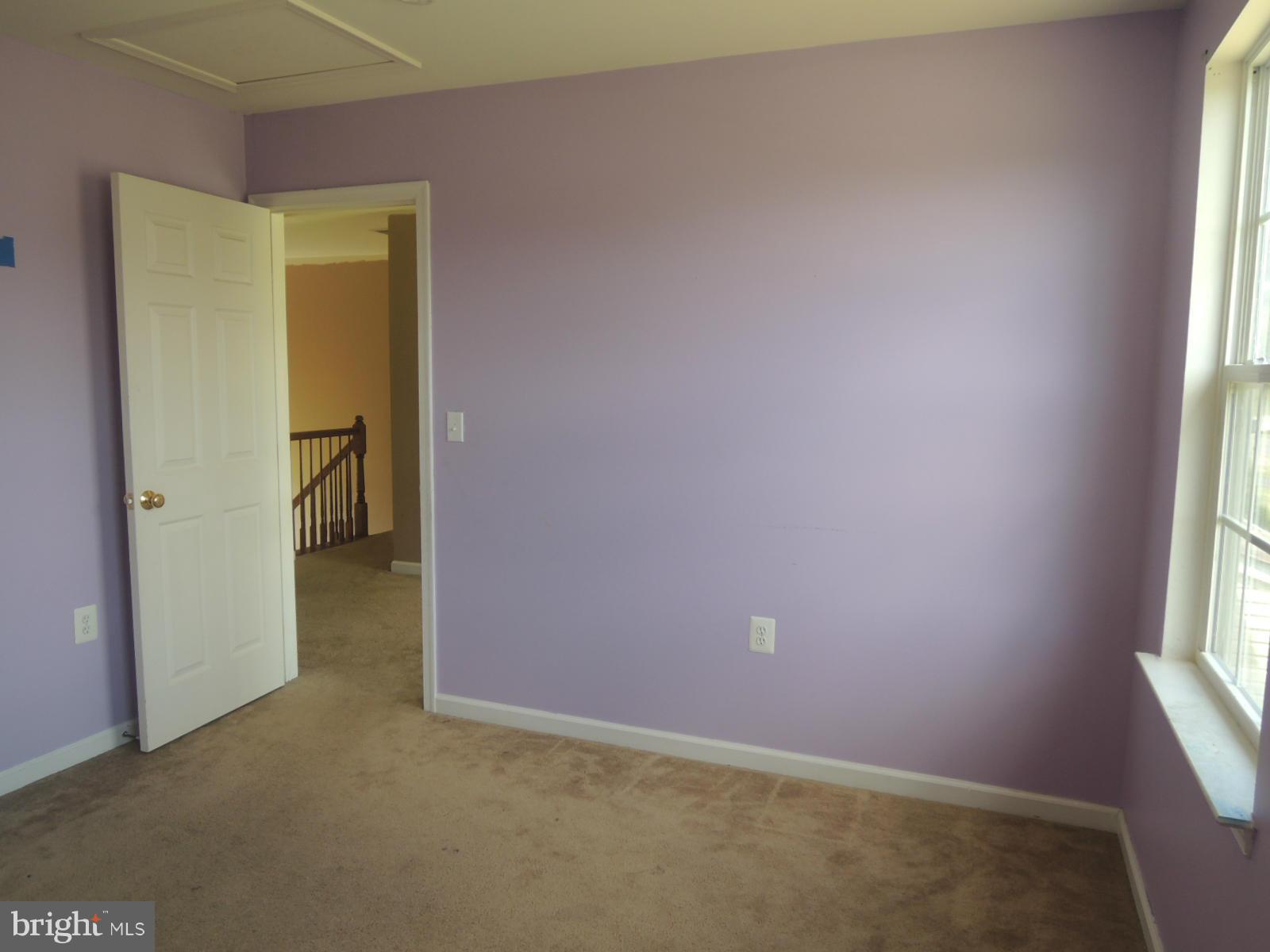 45 Boise Road Inwood, WV 25428 - Photo 20 of 30 an empty room with windows